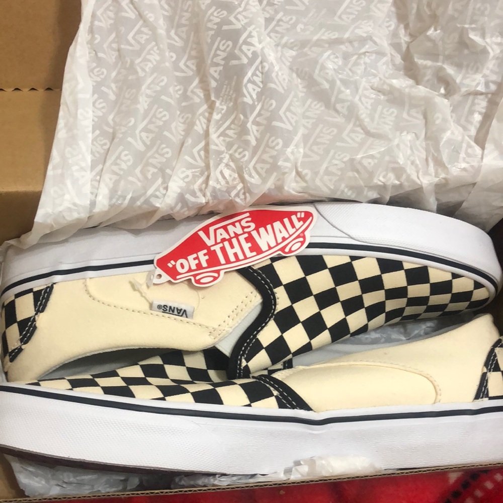 Black and white Checkered slip on vans